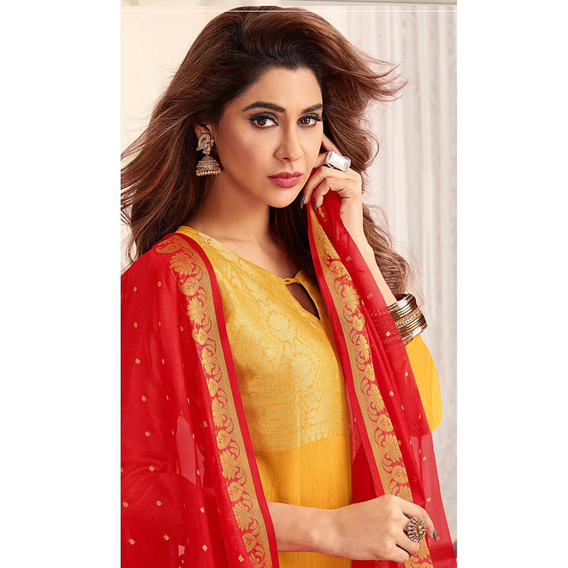 Flattering Yellow Colored Casual Wear Woven Banarasi Silk Dress Material