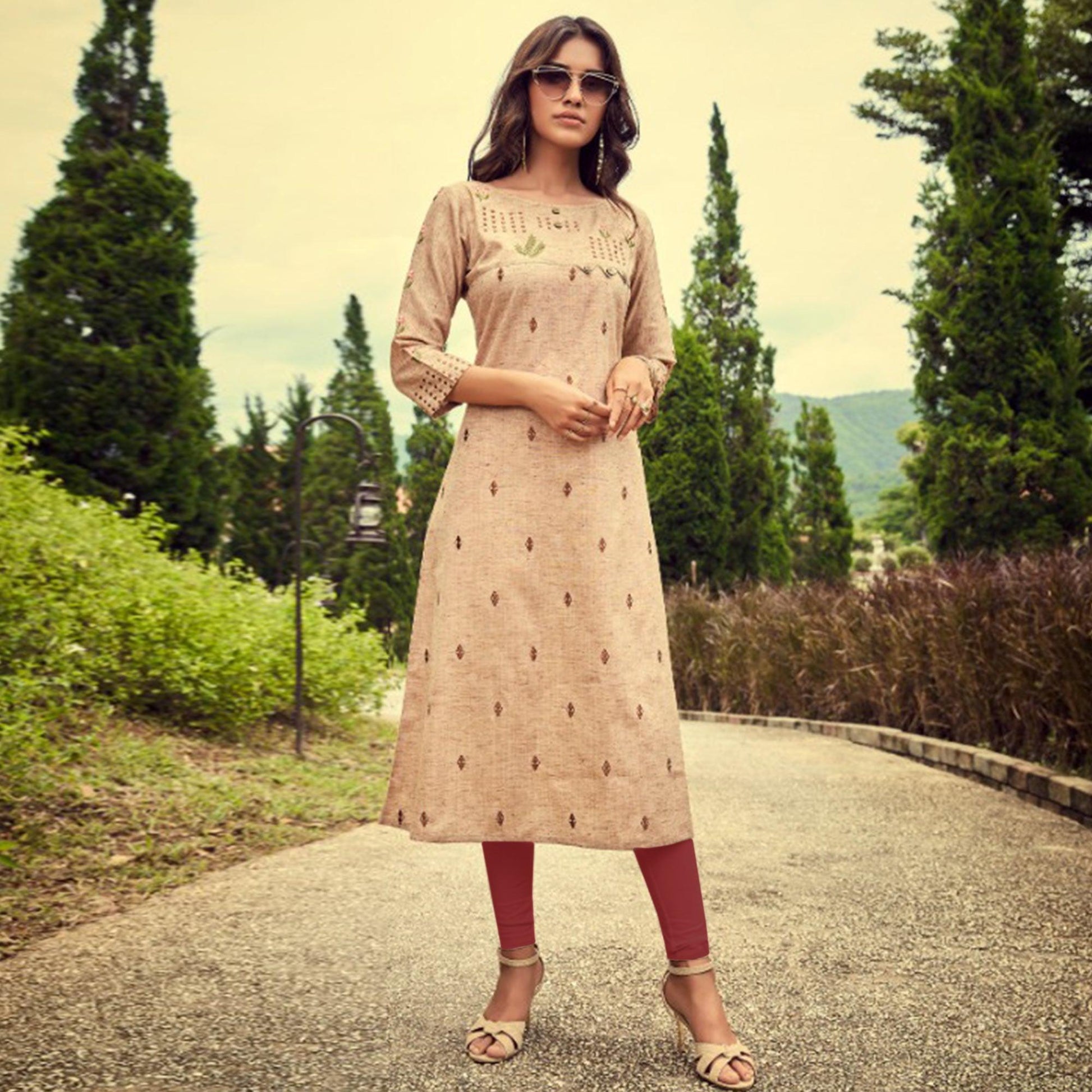 Flaunt Beige Colored Partywear Embroidered Cotton Slub Kurti-Pant Set