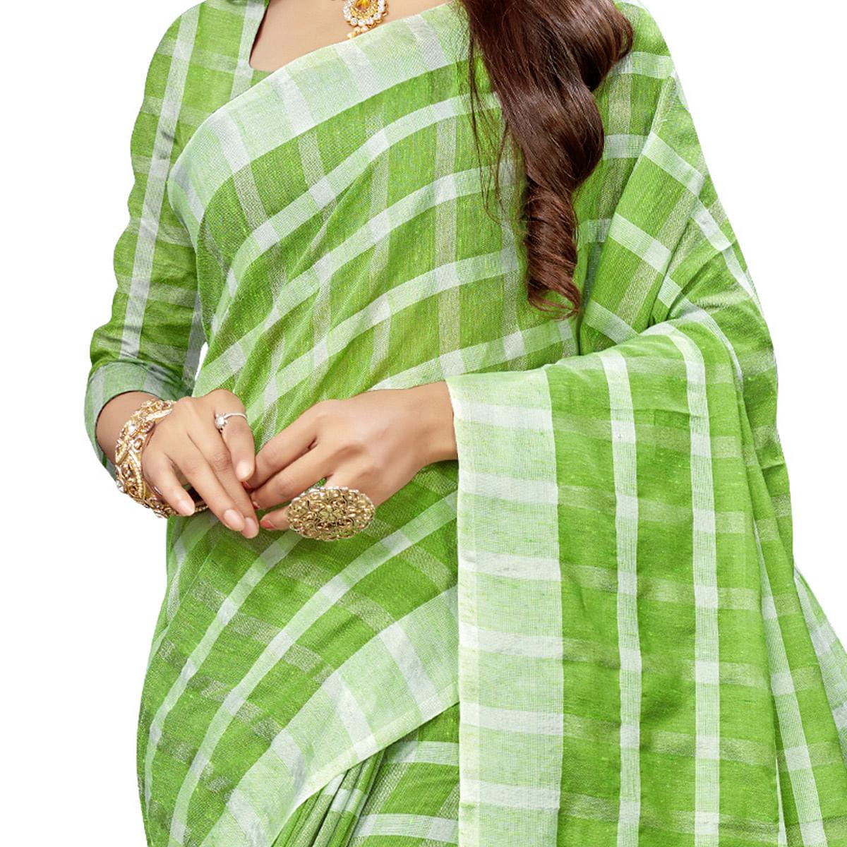 Flaunt Green Colored Fesive Wear Checks Print Cotton Silk Saree With Tassels