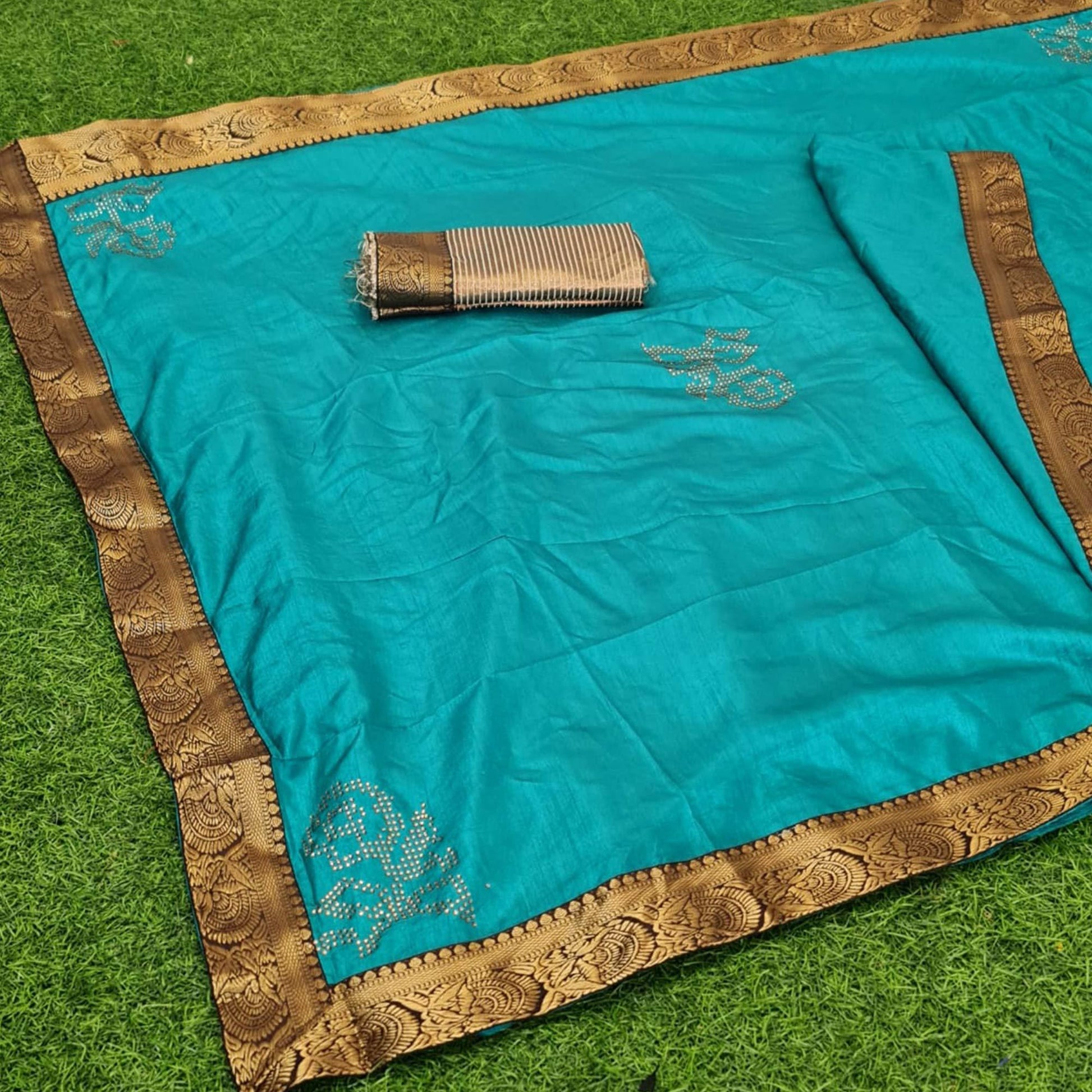 Flaunt Turquoise Coloured Casual Wear Lace Border Dola Silk Saree