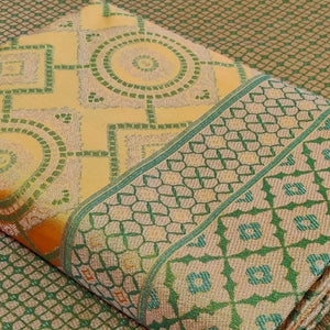 Flaunt Yellow Colored Festive Wear Woven Patola Silk Saree