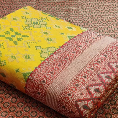 Flaunt Yellow Colored Festive Wear Woven Patola Silk Saree