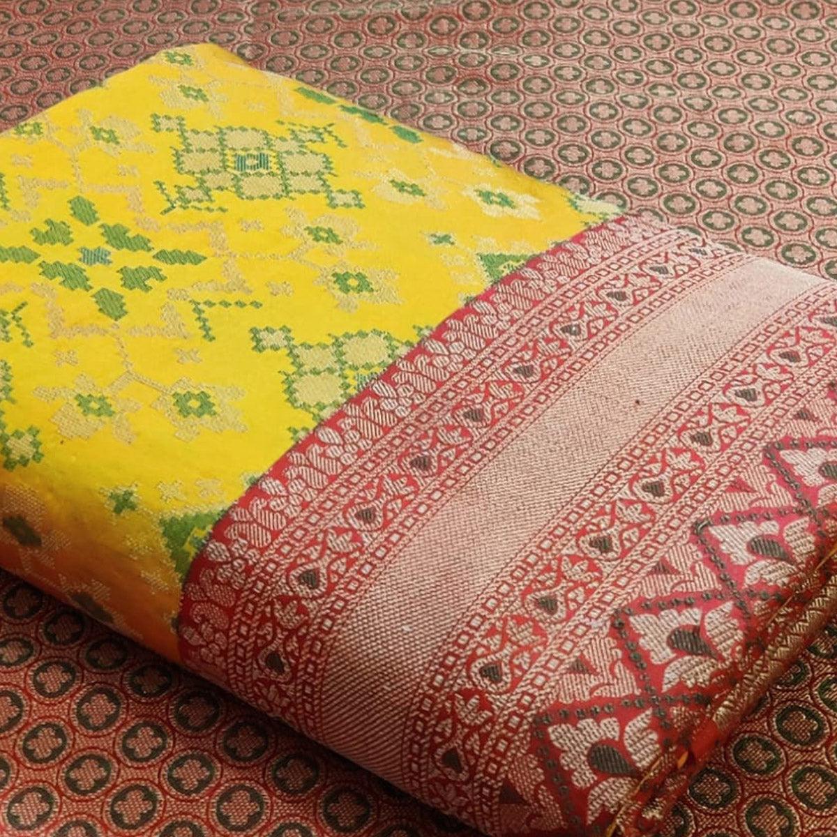 Flaunt Yellow Colored Festive Wear Woven Patola Silk Saree