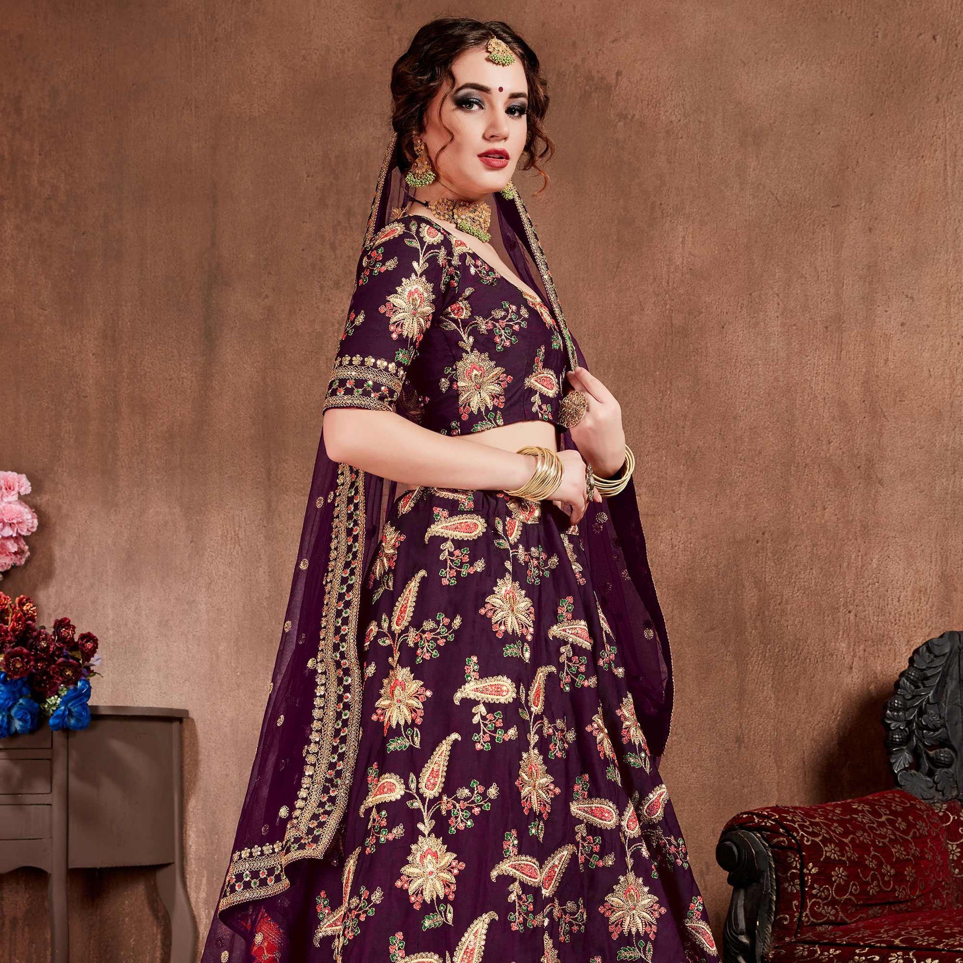 Flirty Purple Colored Partywear Embroidered Tapeta Silk Lehenga Choli
