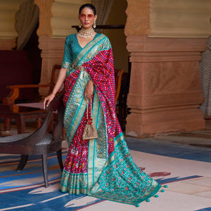 Fuchsia Pink Patola Printed Art Silk Saree With Tassels