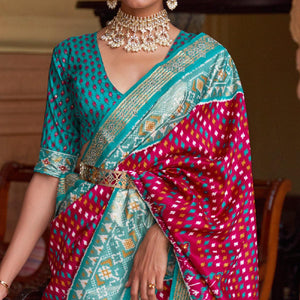 Fuchsia Pink Patola Printed Art Silk Saree With Tassels