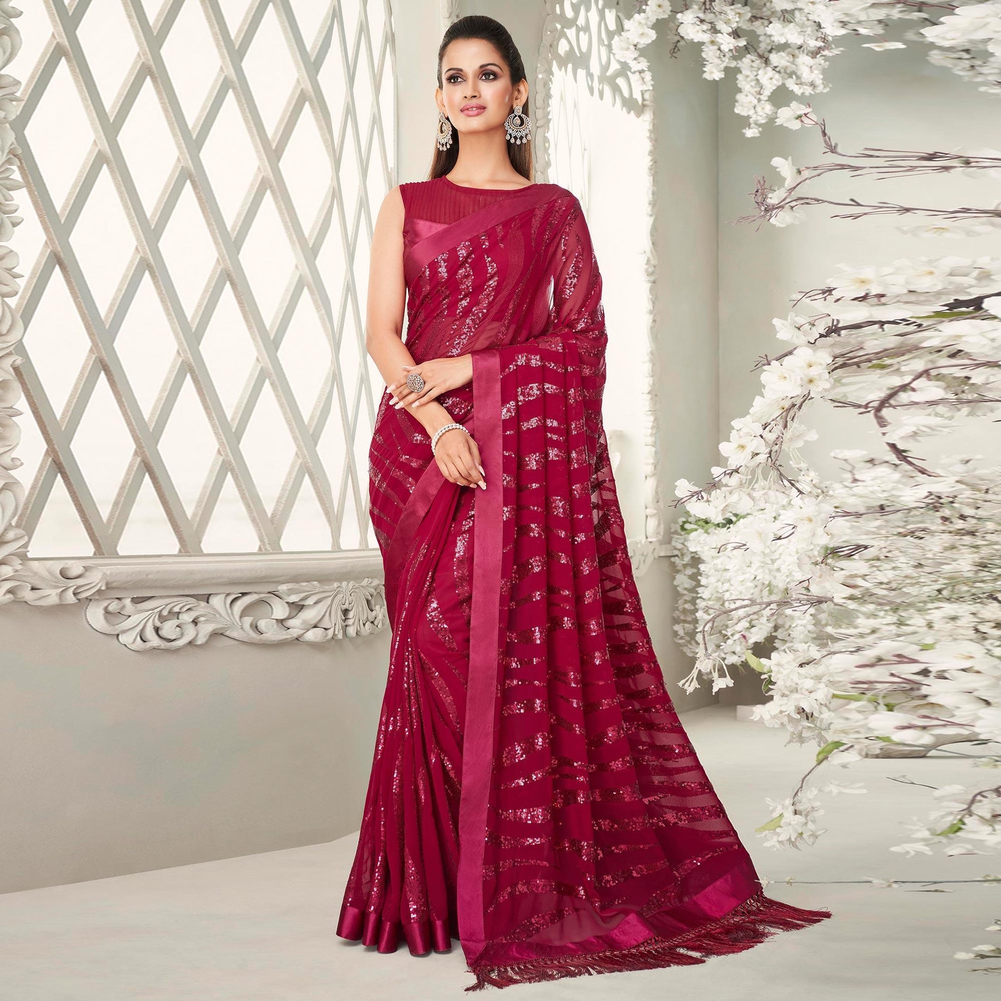 Fuchsia Pink Sequins Embroidered Georgette Saree With Tassels