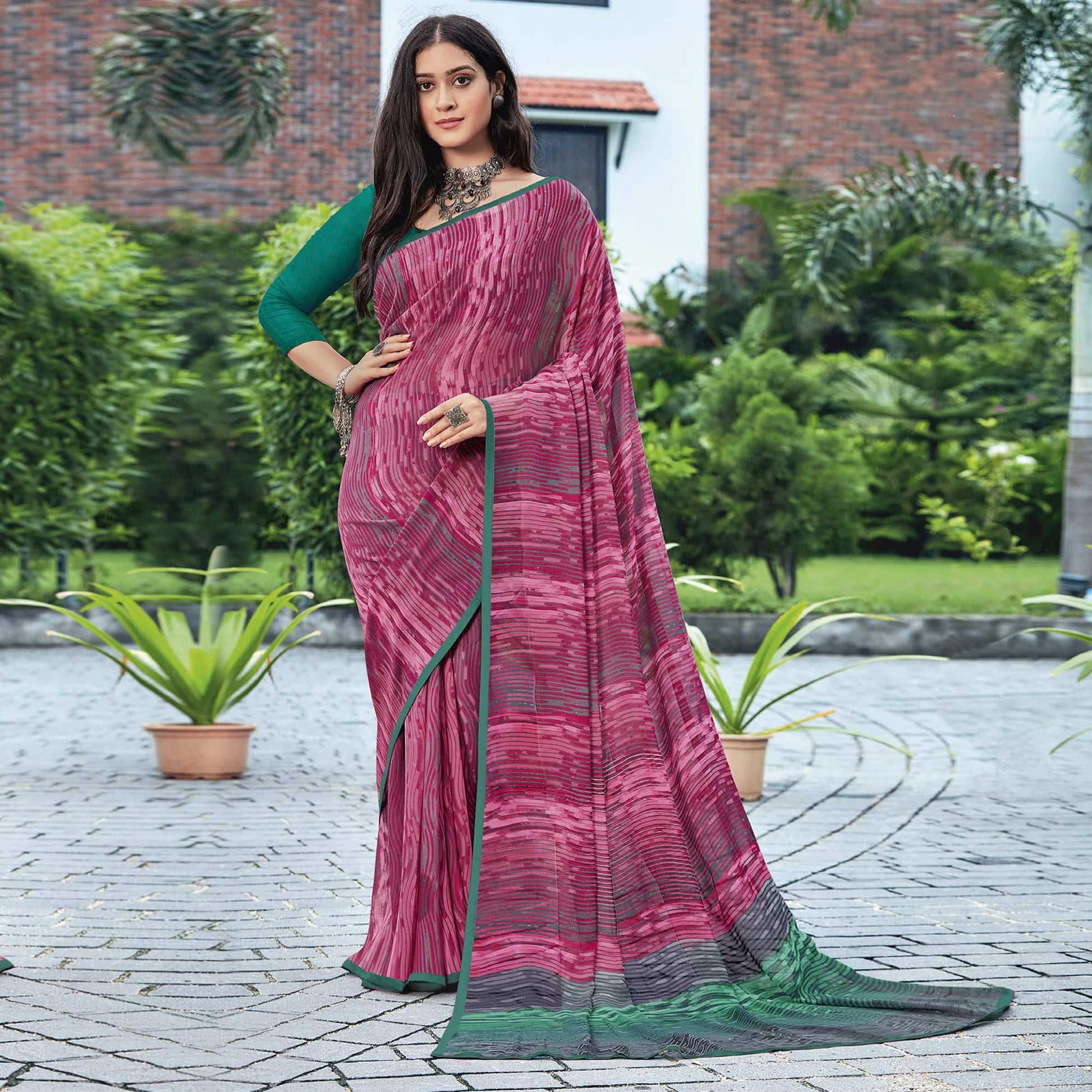 Gajari Pink Casual Wear Striped Printed Georgette Saree