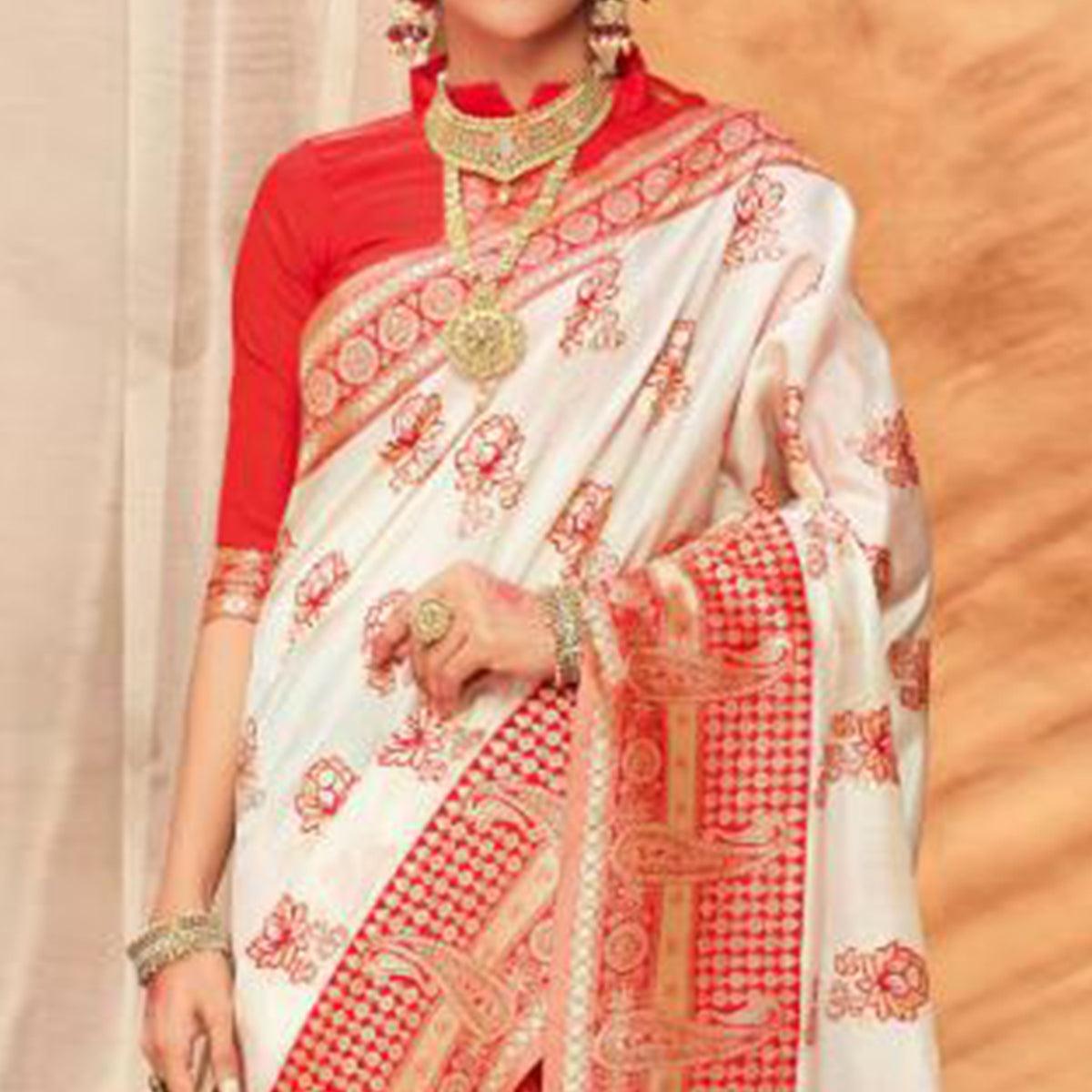 Gleaming Cream & Red Colored Festive Wear Woven Silk Blend Saree With Tassels