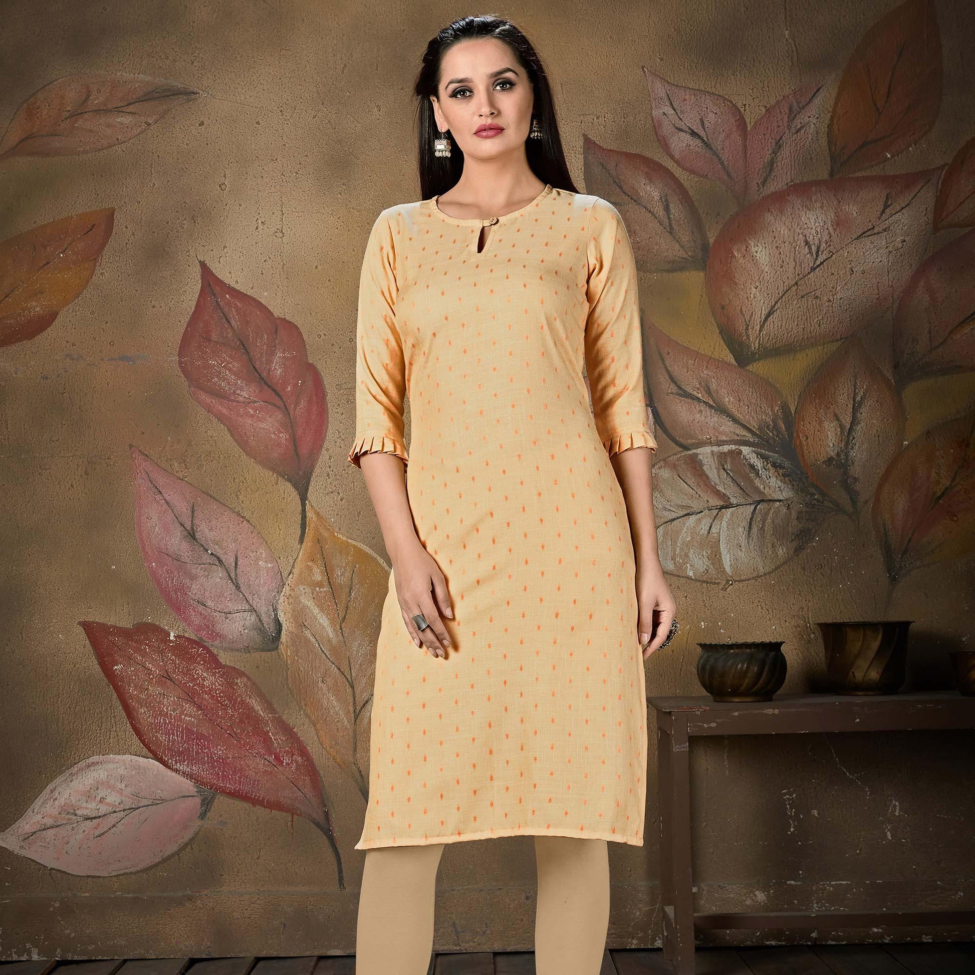 Gleaming Light Peach Colored Casual Embroidered Cotton Kurti
