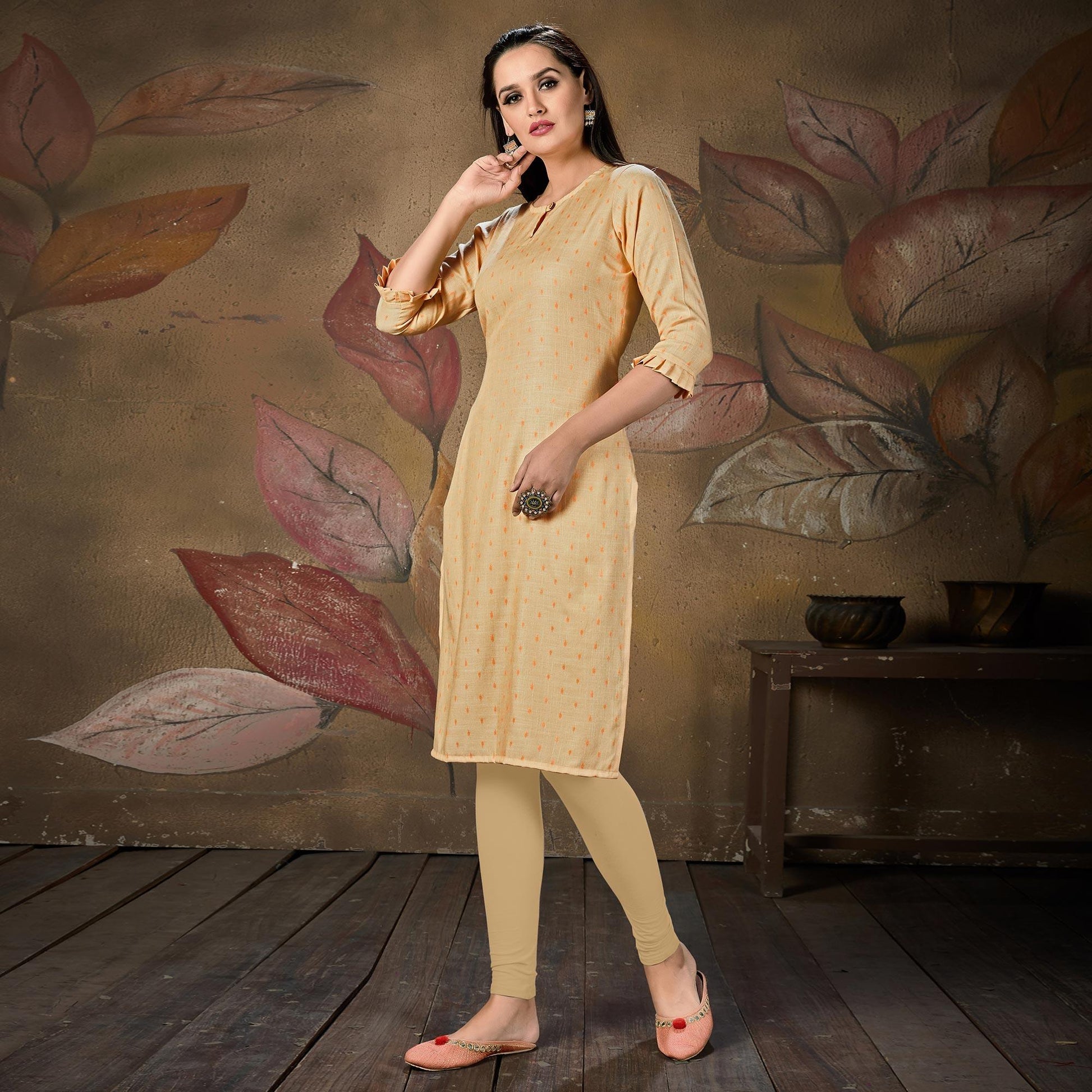 Gleaming Light Peach Colored Casual Embroidered Cotton Kurti
