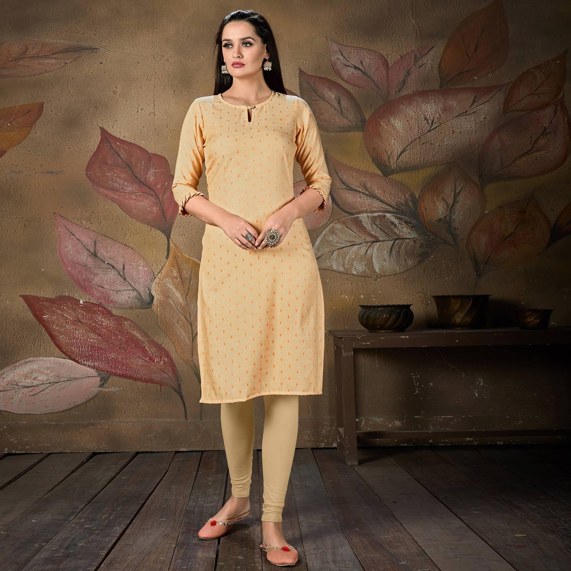 Gleaming Light Peach Colored Casual Embroidered Cotton Kurti