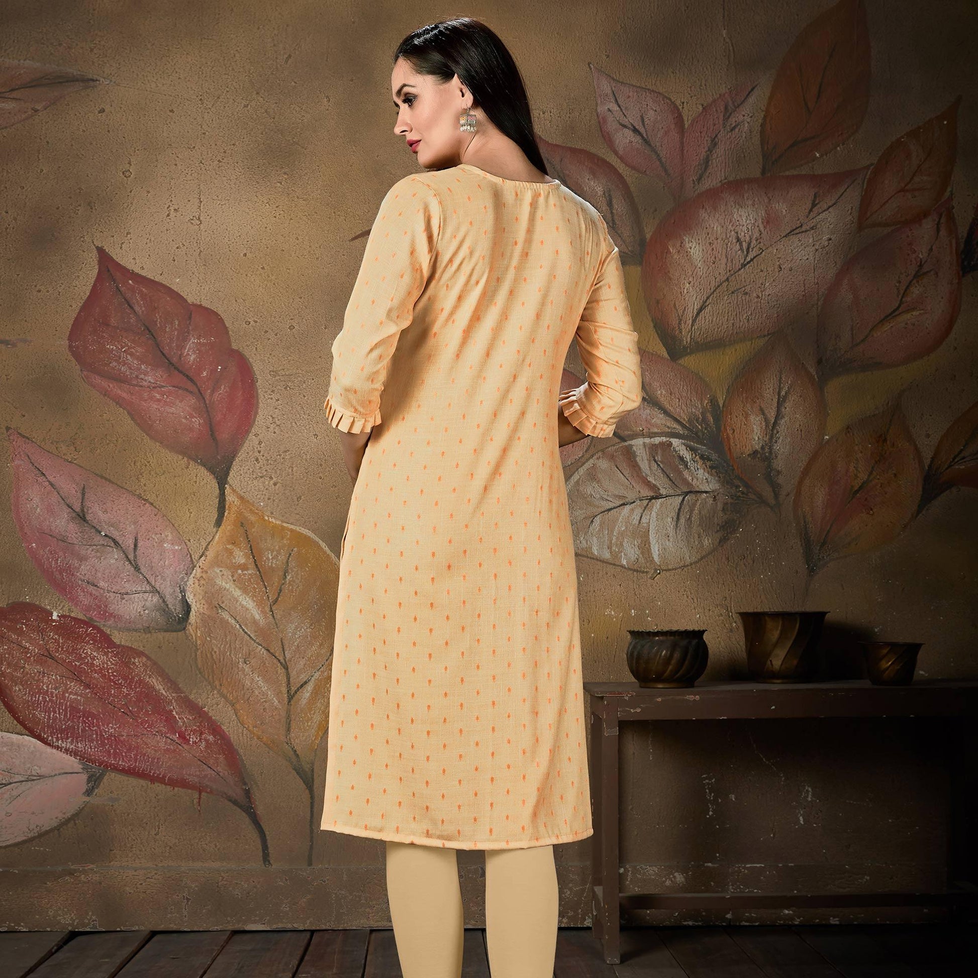 Gleaming Light Peach Colored Casual Embroidered Cotton Kurti