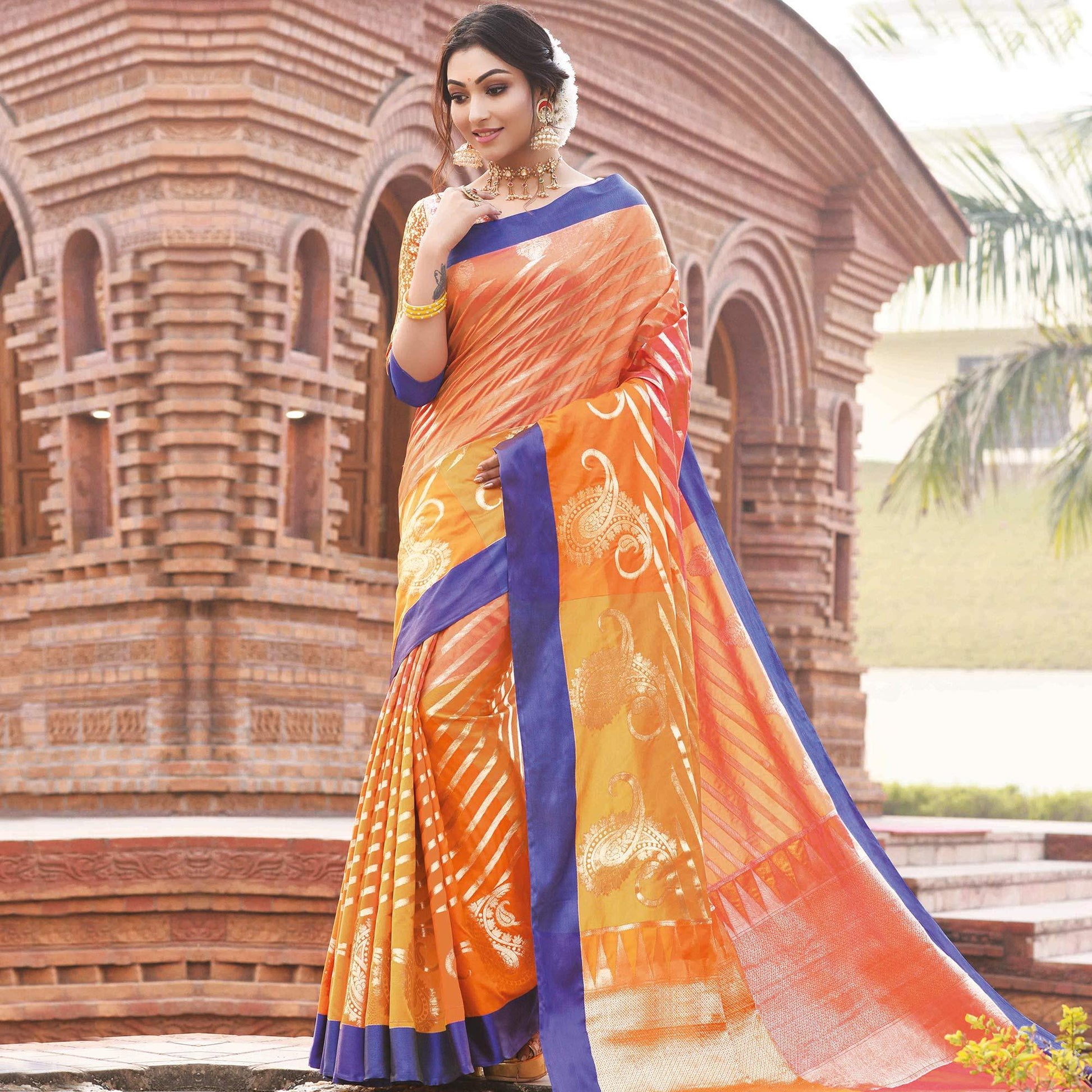 Gleaming Orange Colored Festive Wear Woven Handloom Silk Saree