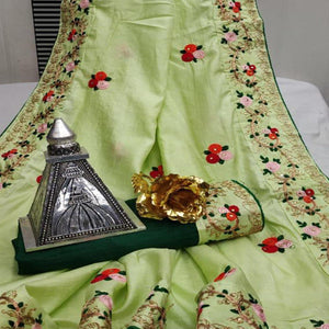 Gleaming Pista Green Colored Festive Wear Woven Dora Silk Saree