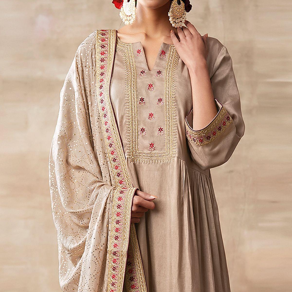 Glorious Cream Colored Partywear Designer Embroidery Heavy chinon Salwar Suit