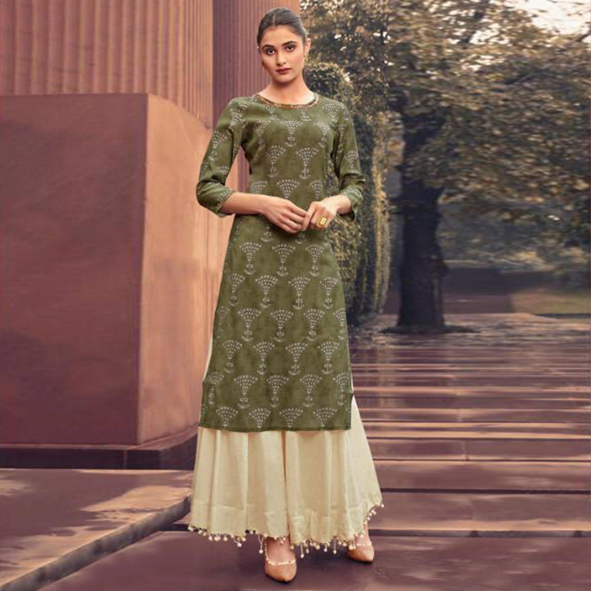 Glorious Green Colored Casual Wear Printed Muslin Kurti