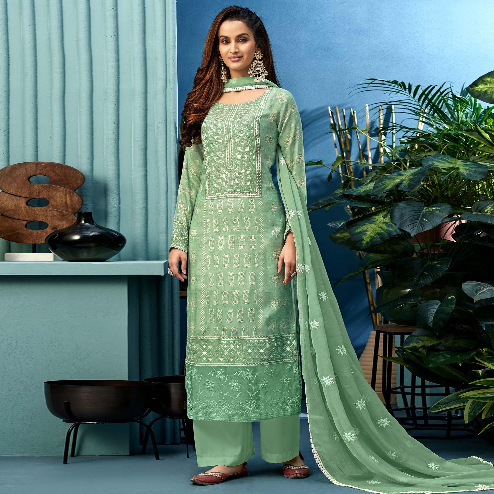 Glorious Green Colored Partywear Digital Printed Pure Muslin Palazzo Suit