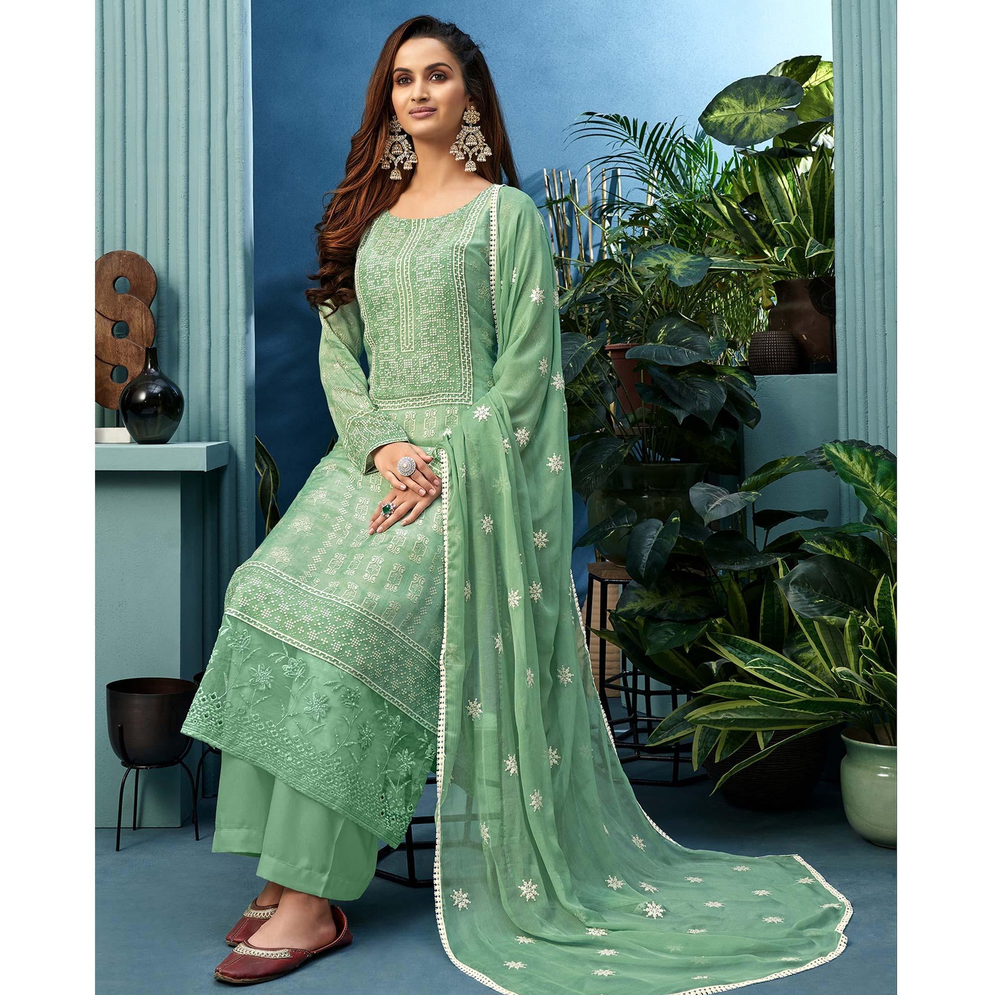 Glorious Green Colored Partywear Digital Printed Pure Muslin Palazzo Suit