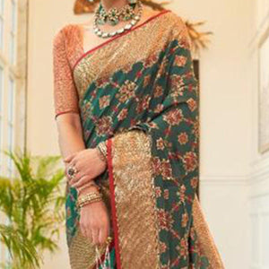 Glorious Green Coloured Festive Wear Indian Patola Woven Silk Saree
