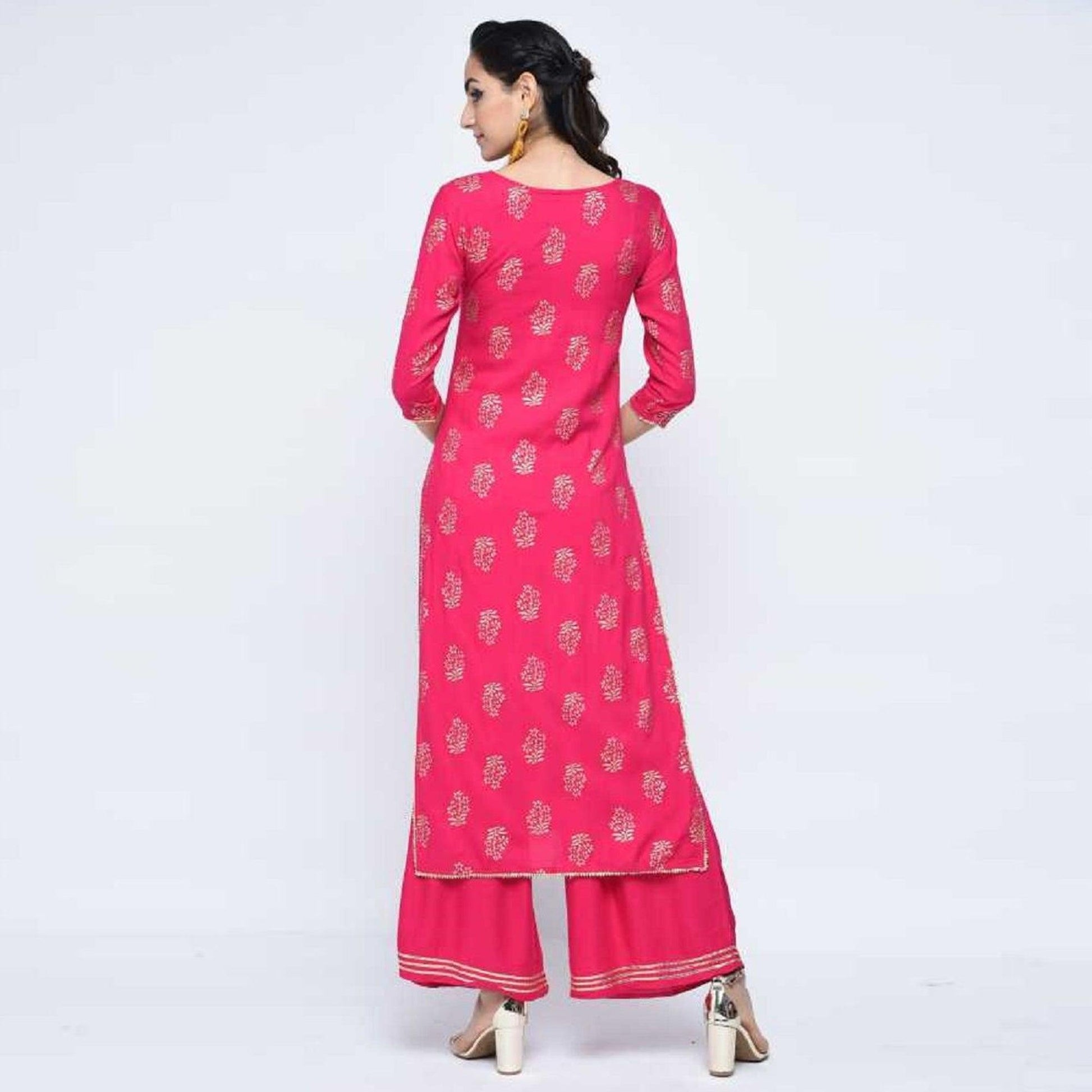 Glorious Pink Colored Casual Wear Printed Straight Calf Length Rayon Kurti