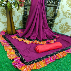 Glorious Wine Colored Partywear Solid Vichitra Silk Saree With Bandhani Print Ruffle