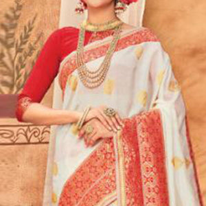 Glowing Cream & Red Colored Festive Wear Woven Silk Blend Saree With Tassels