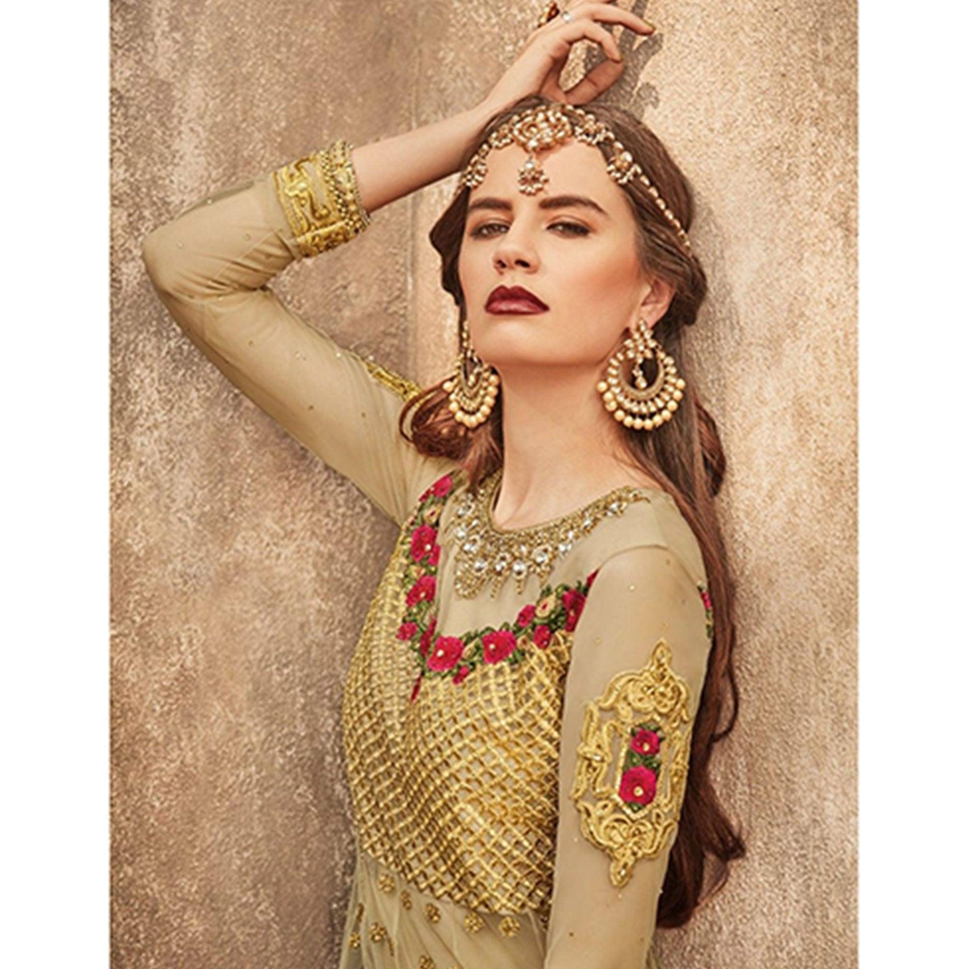 Glowing Golden-Pink Colored Party Wear Embroidered Net Lehenga Choli
