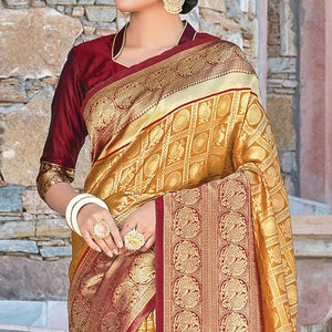 Glowing Golden-Yellow Colored Festive Wear Woven Silk Sareee