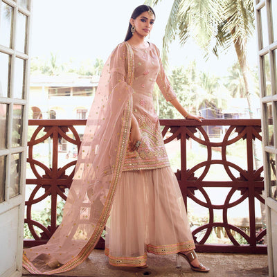 Glowing Light Peach Coloured Partywear Thread Foil Mirror Work Organza Pallazo Suit