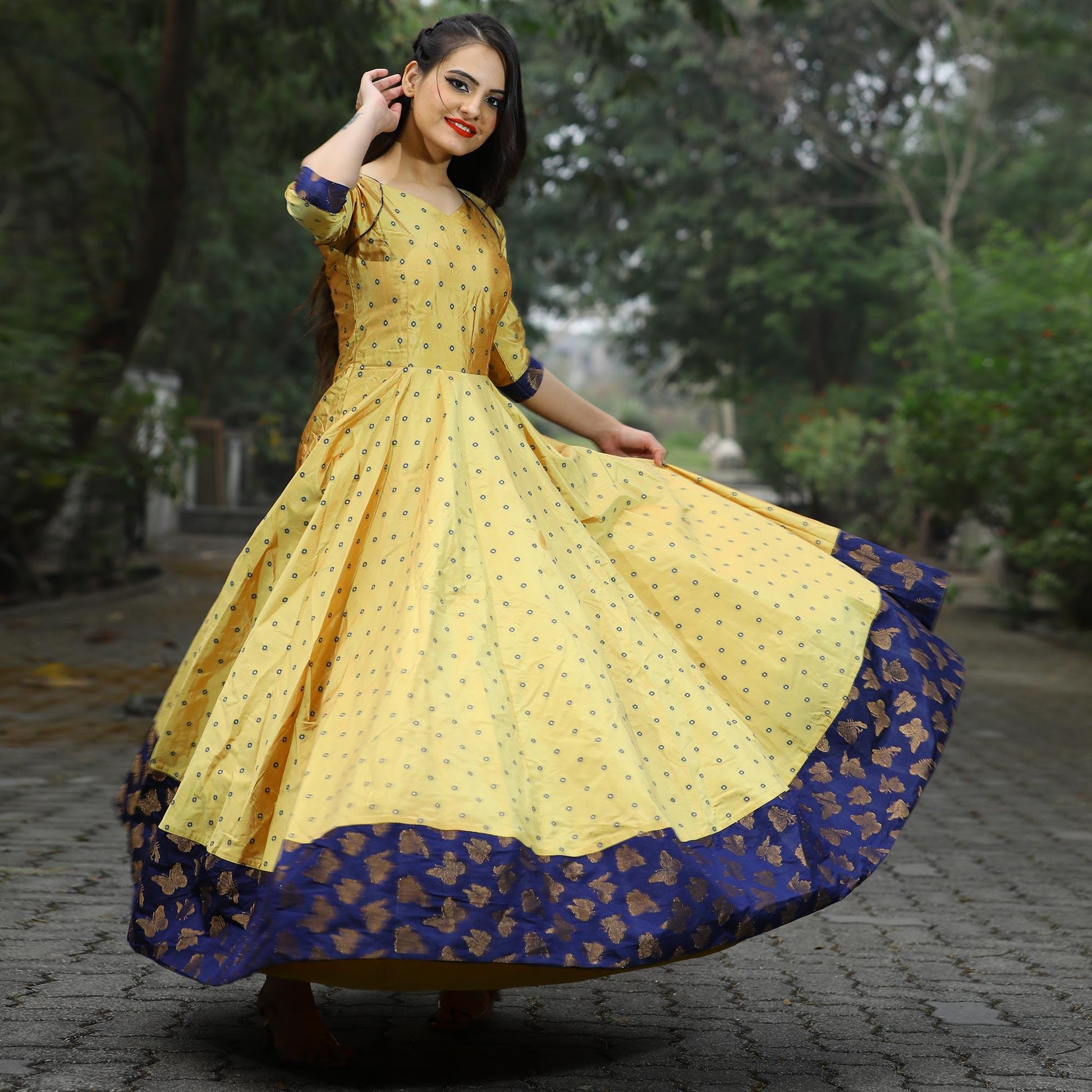 Glowing Light Yellow Colored Partywear Tapetta Gown