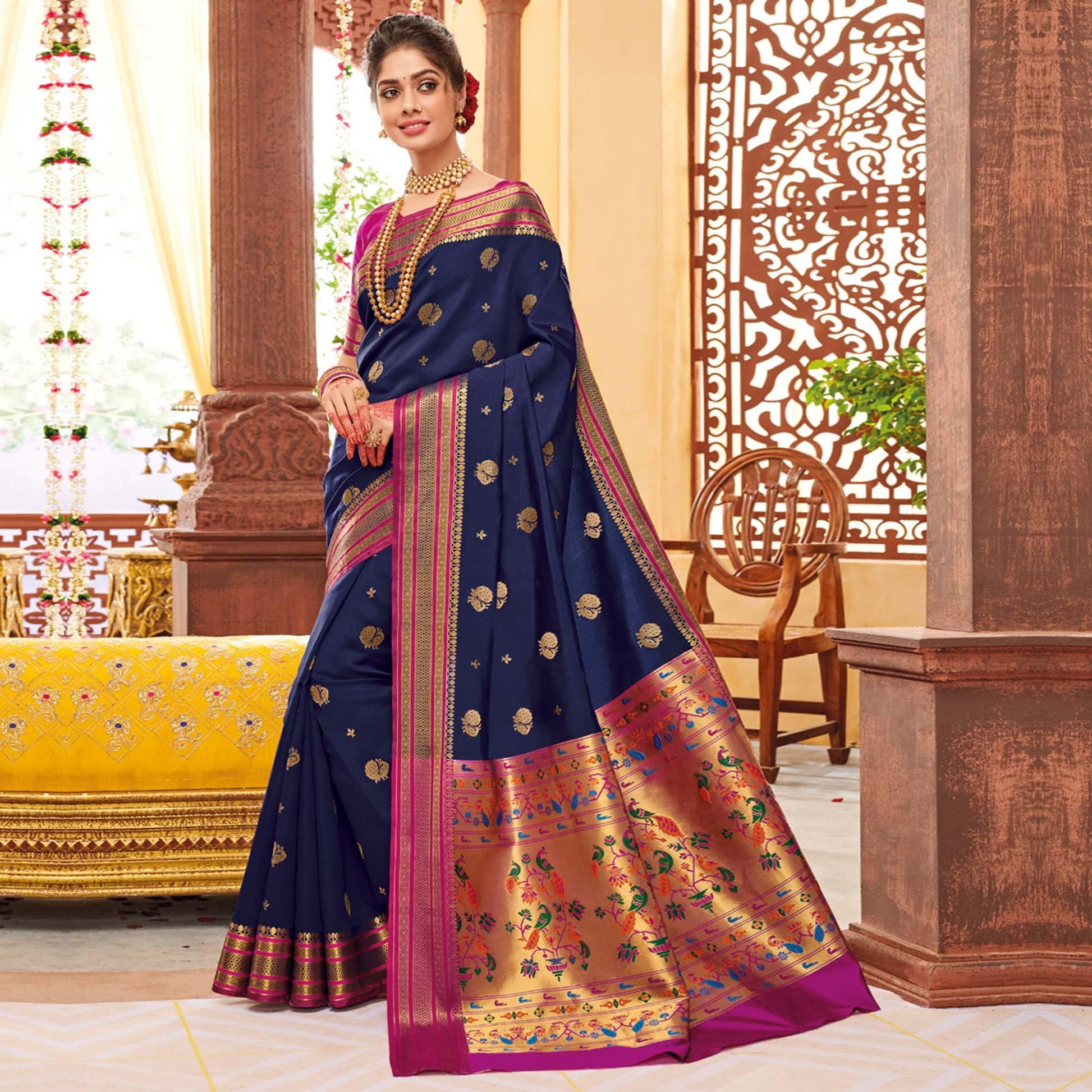 glowing-navy-blue-colored-festive-wear-woven-silk-saree-43565