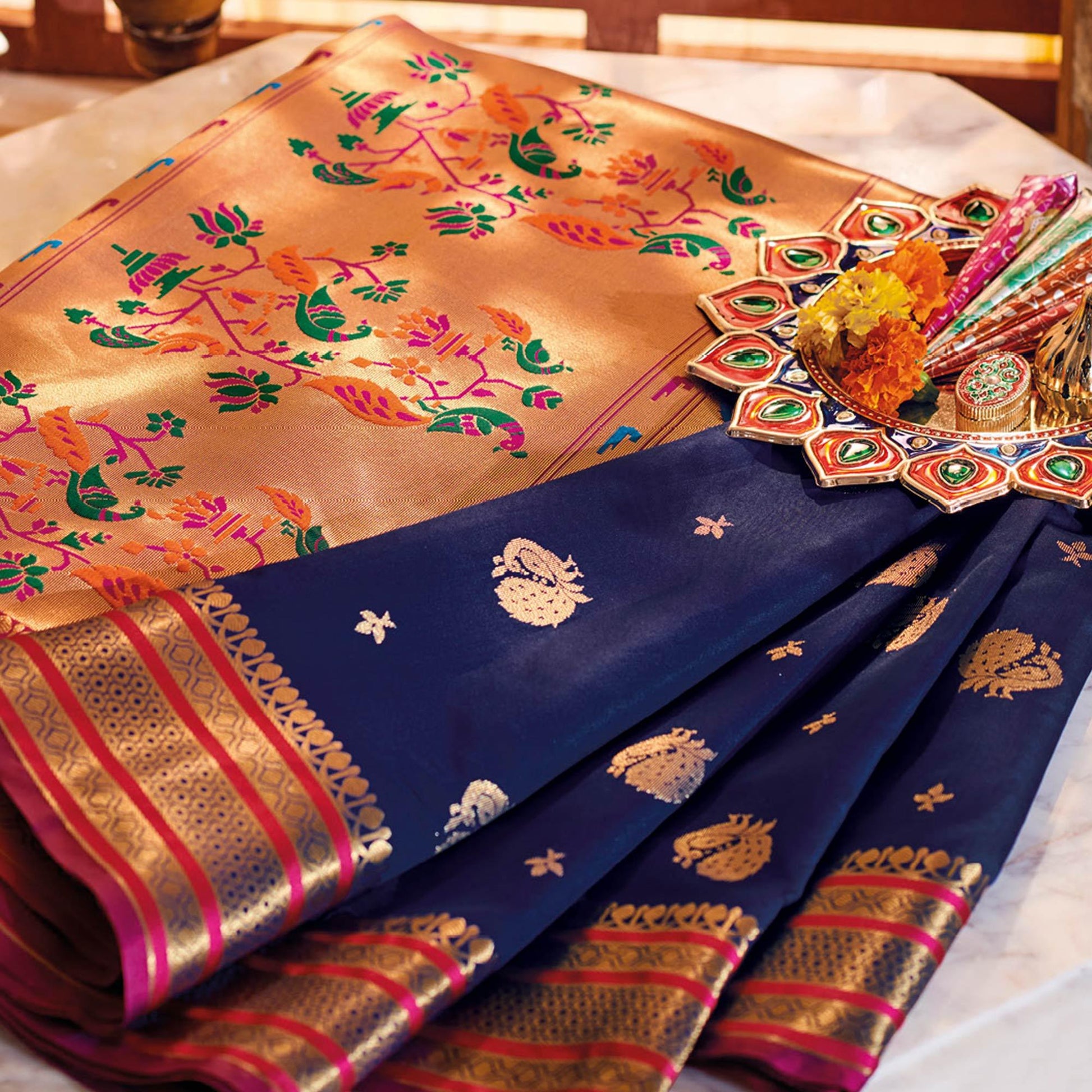 glowing-navy-blue-colored-festive-wear-woven-silk-saree-43565