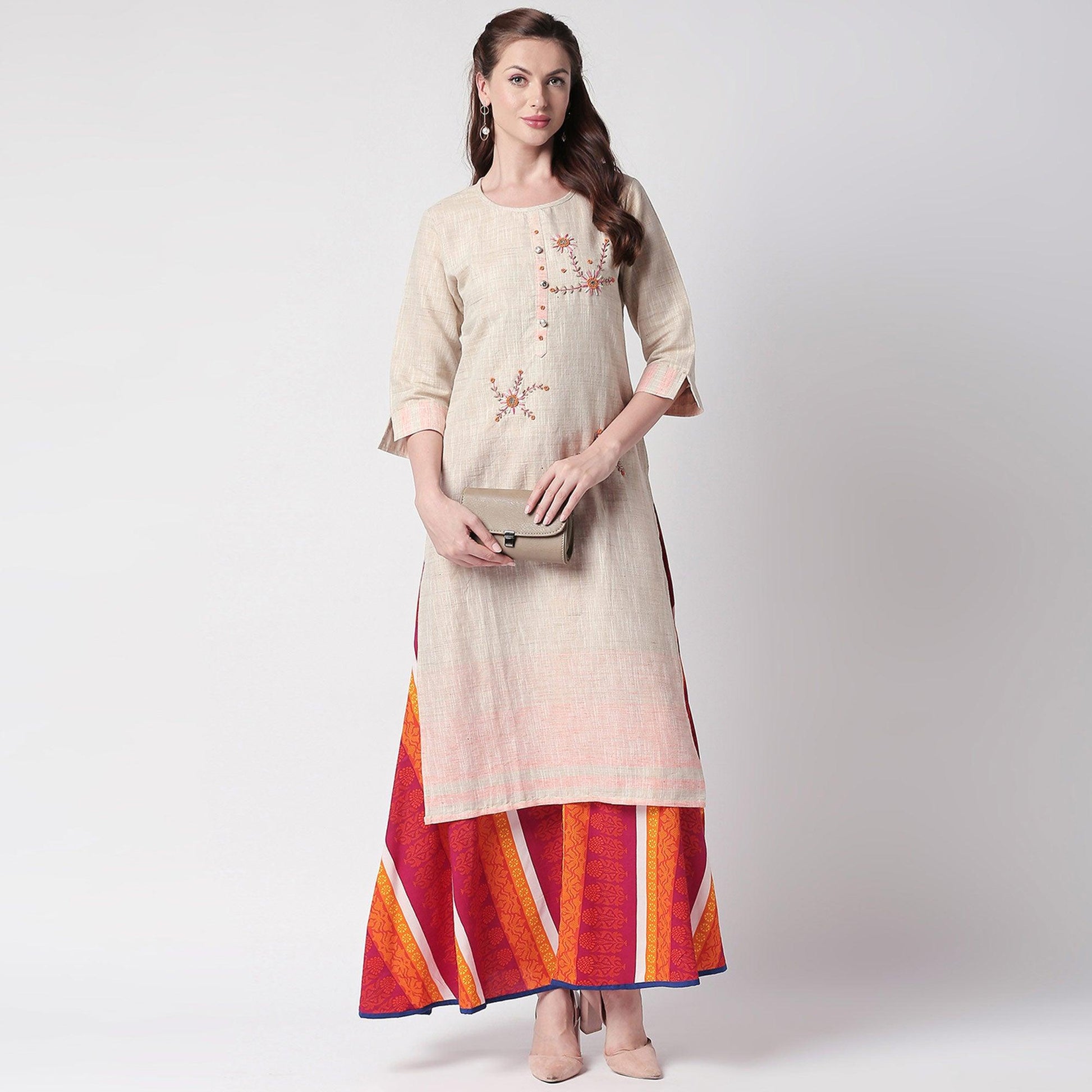 glowing-off-white-colored-partywear-embroidered-cotton-kurti-skirt-set-41536