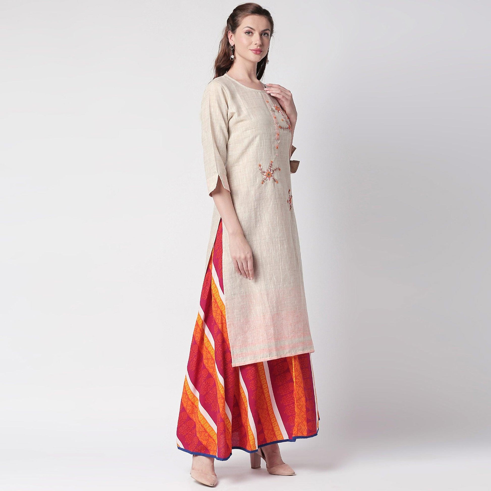 glowing-off-white-colored-partywear-embroidered-cotton-kurti-skirt-set-41536