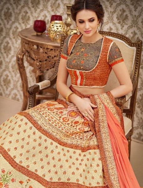glowing-orange-beige-colored-designer-partywear-digital-printed-woven-banarasi-silk-lehenga-choli