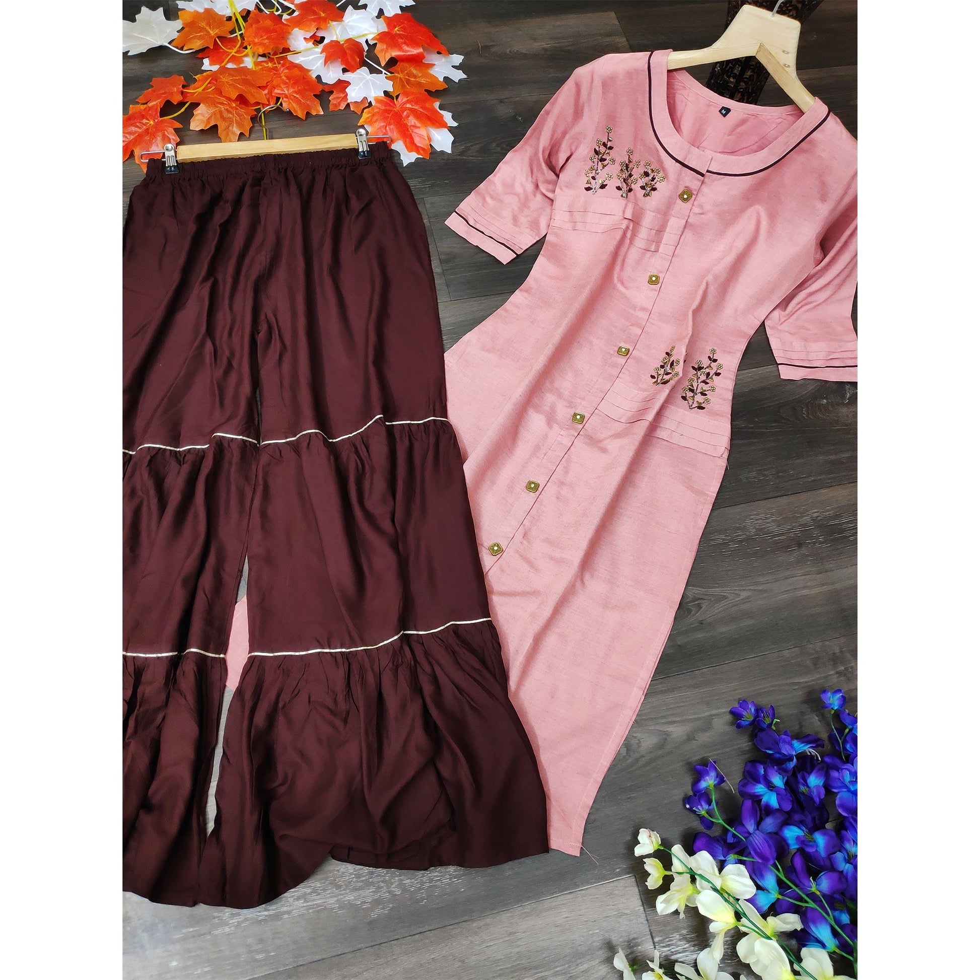 glowing-pink-colored-party-wear-khatli-work-rayon-kurti-sharara-set-69871