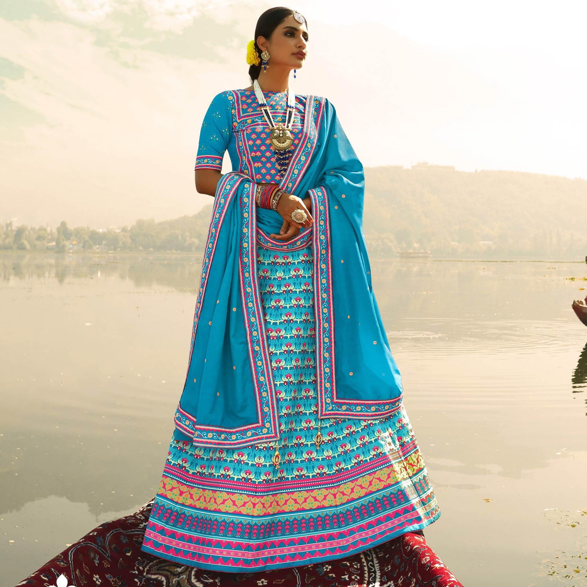 glowing-sky-blue-coloured-wedding-wear-designer-stone-work-heavy-silk-lehenga-choli-98184