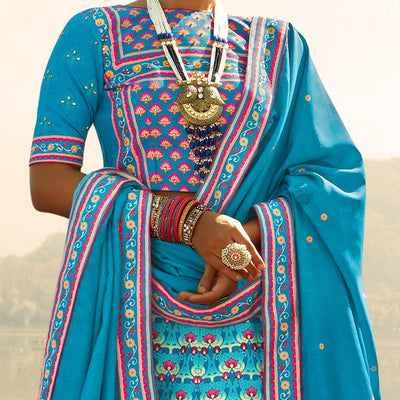 glowing-sky-blue-coloured-wedding-wear-designer-stone-work-heavy-silk-lehenga-choli-98184