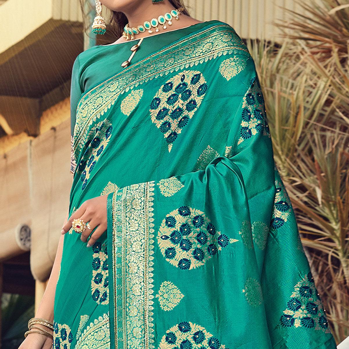 glowing-turquoise-blue-colored-festive-wear-woven-silk-saree-103555
