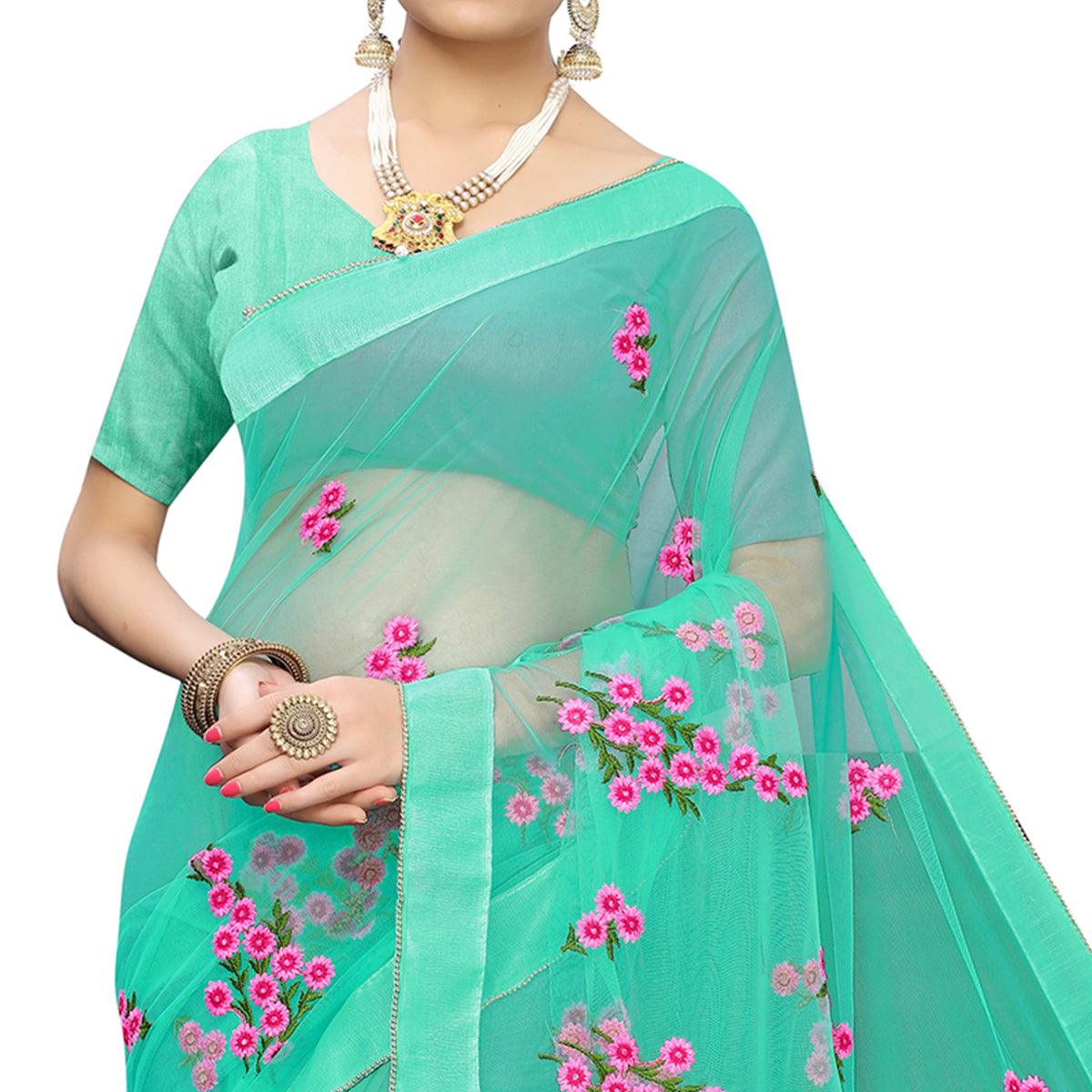 glowing-turquoise-green-colored-party-wear-embroidered-net-saree-46432