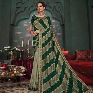 graceful-green-colored-festive-wear-embroidered-heavy-border-fancy-fabric-saree-97324