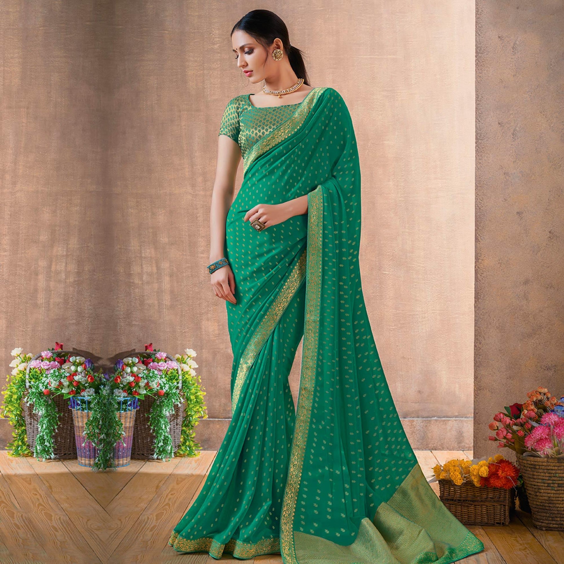 graceful-green-colored-festive-wear-foil-printed-georgette-saree-77581