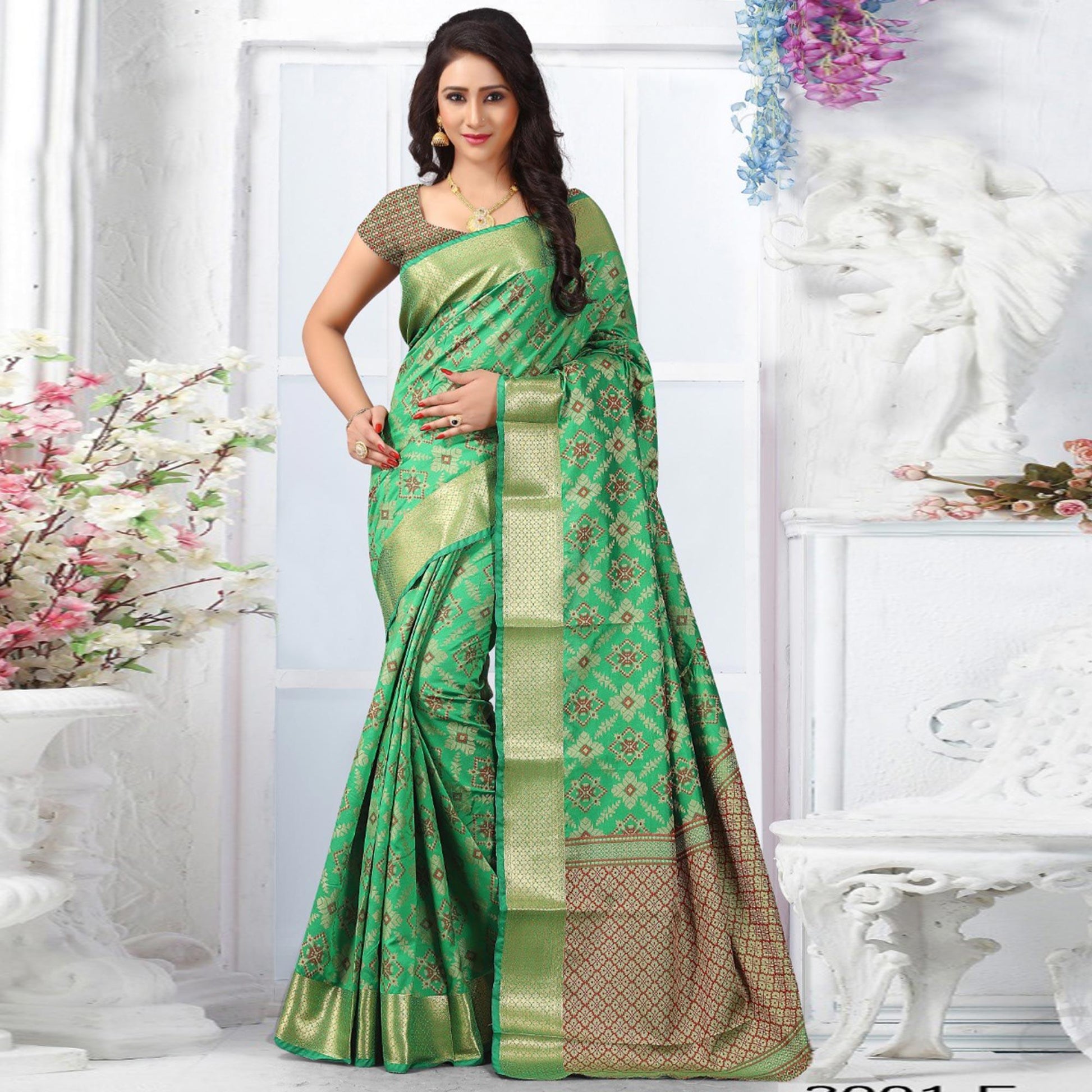 graceful-green-colored-festive-wear-woven-banarasi-silk-saree