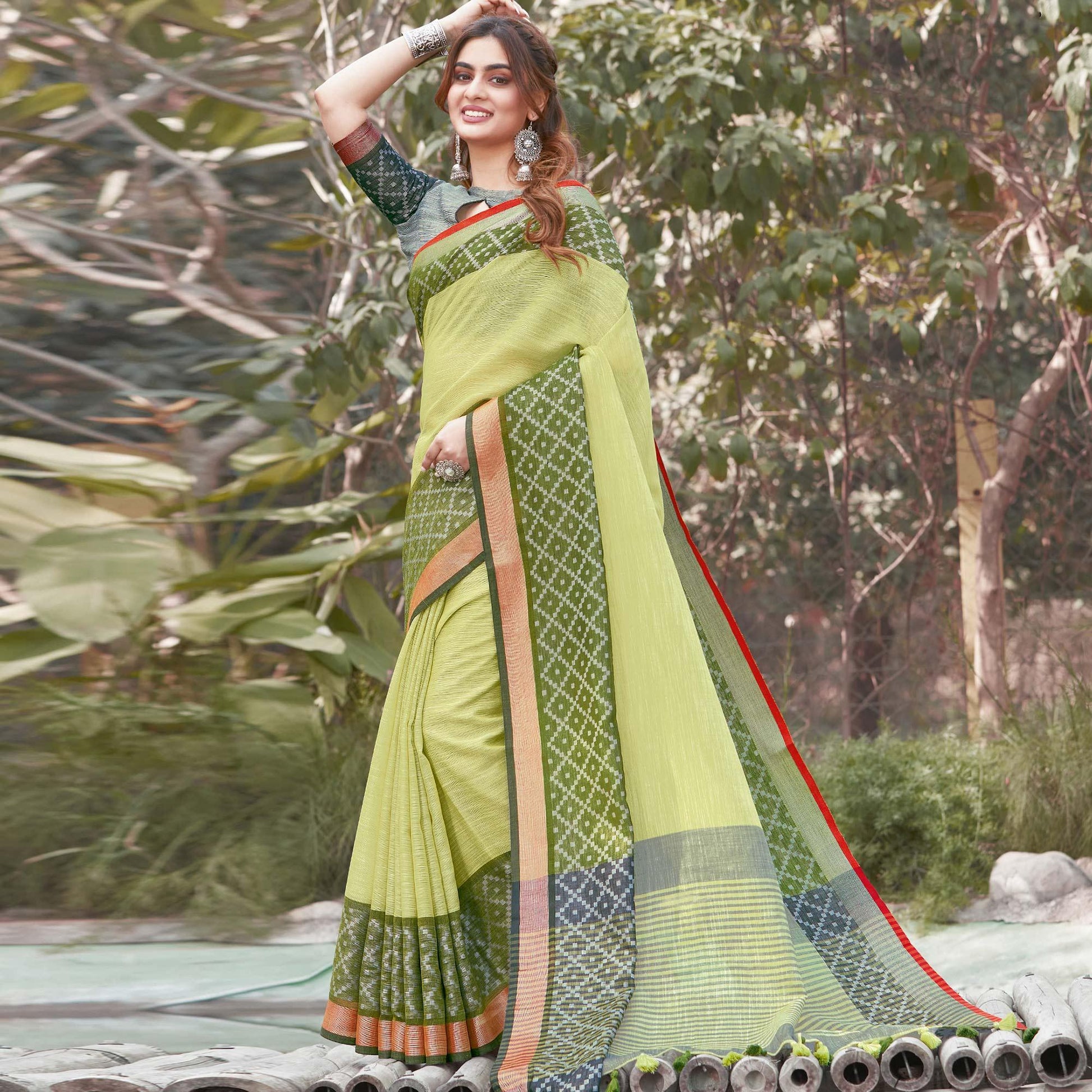 graceful-green-colored-festive-wear-woven-linen-saree-93761