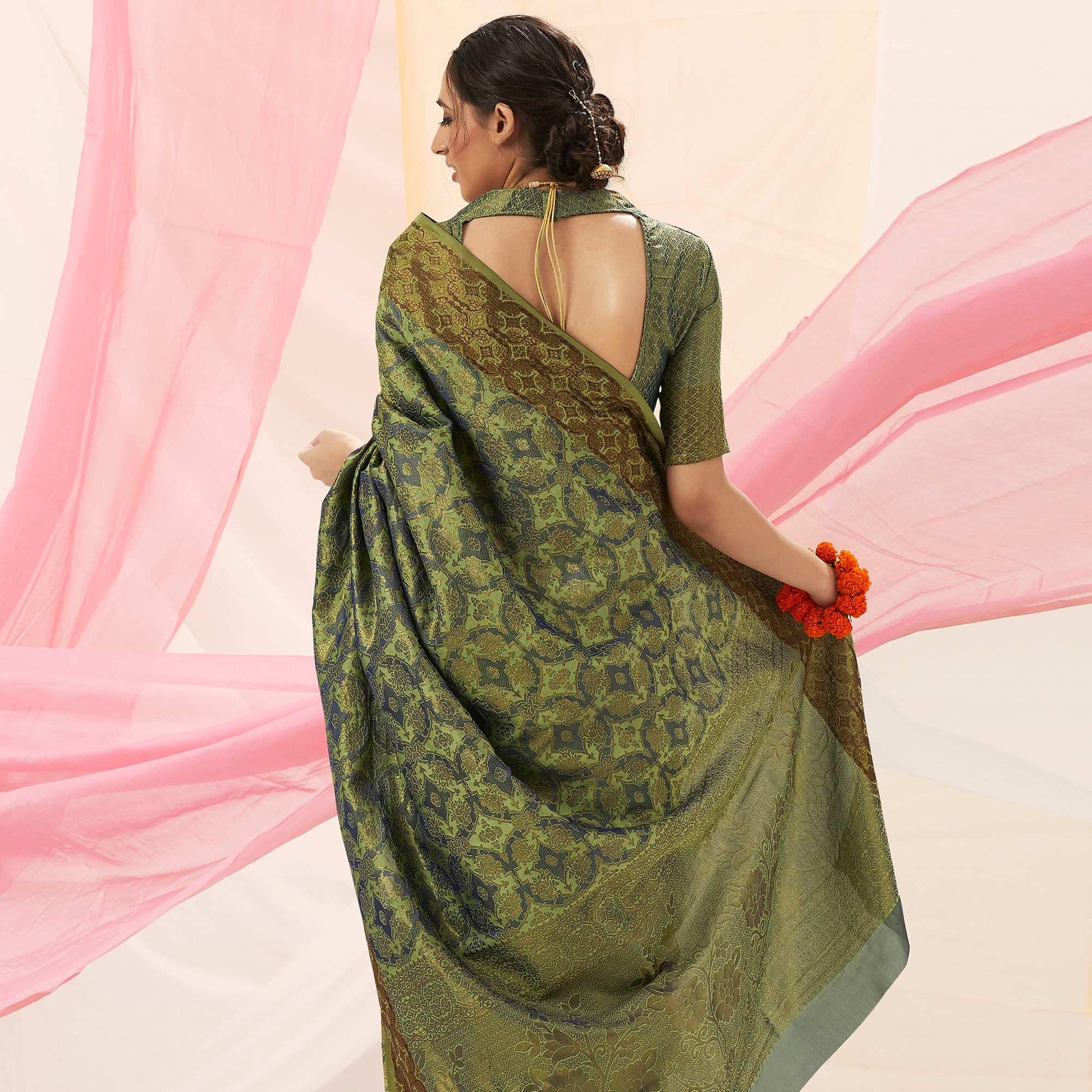 graceful-green-colored-festive-wear-woven-soft-silk-saree-69039