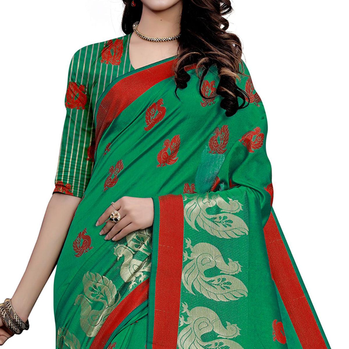 graceful-green-colored-festive-wear-woven-work-art-silk-saree