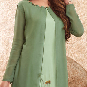 graceful-green-colored-party-wear-floral-embroidered-viscose-muslin-cotton-silk-kurti-67566