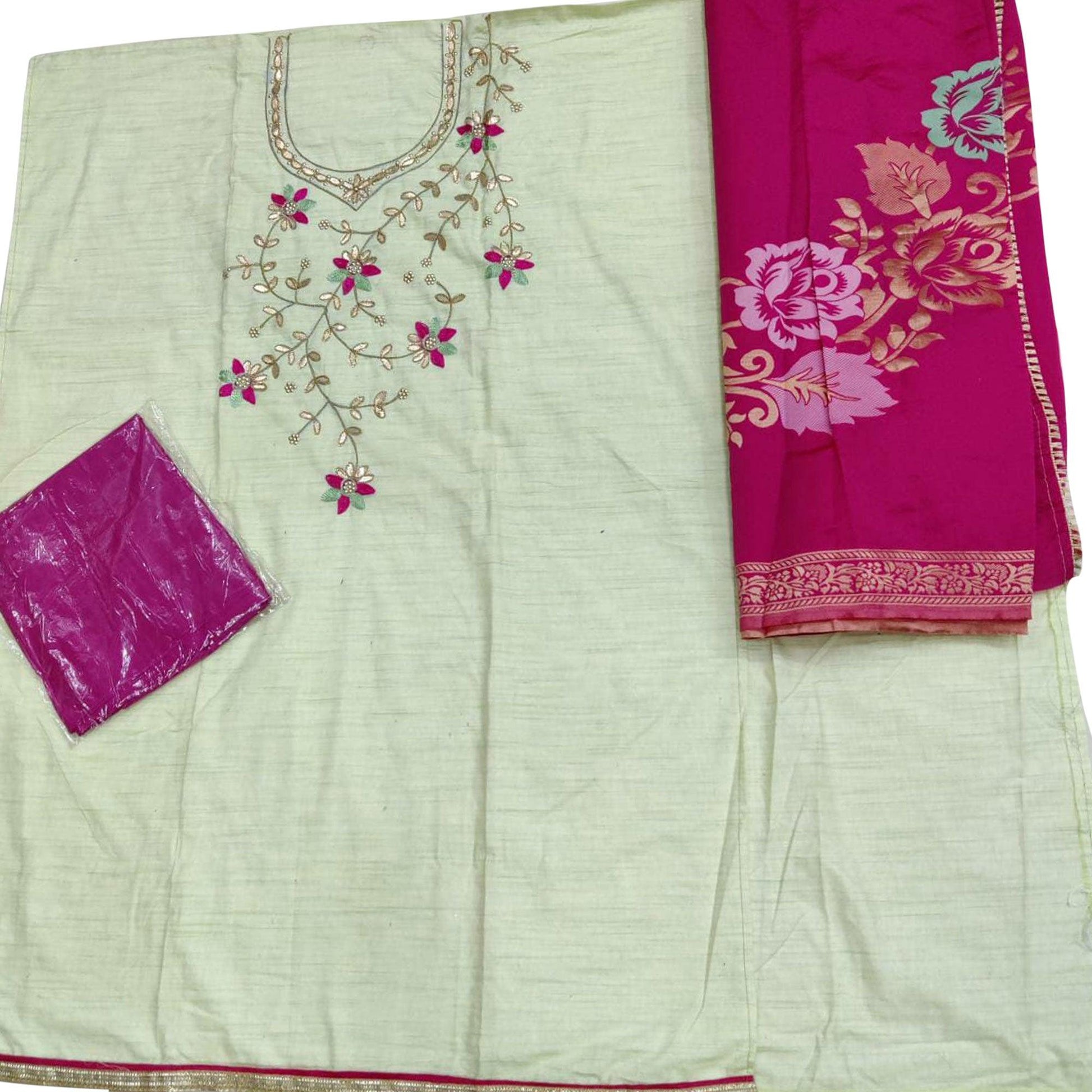 graceful-light-green-colored-partywear-embroidered-handloom-cotton-dress-material-98972