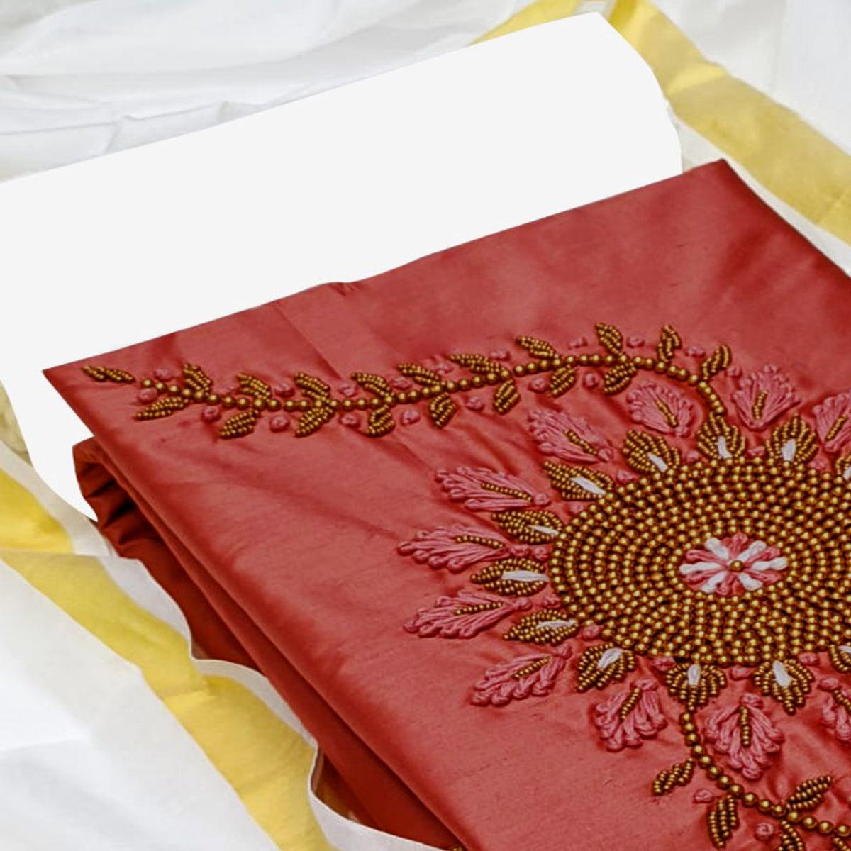 graceful-orange-colored-partywear-embroidered-cotton-dress-material-78553